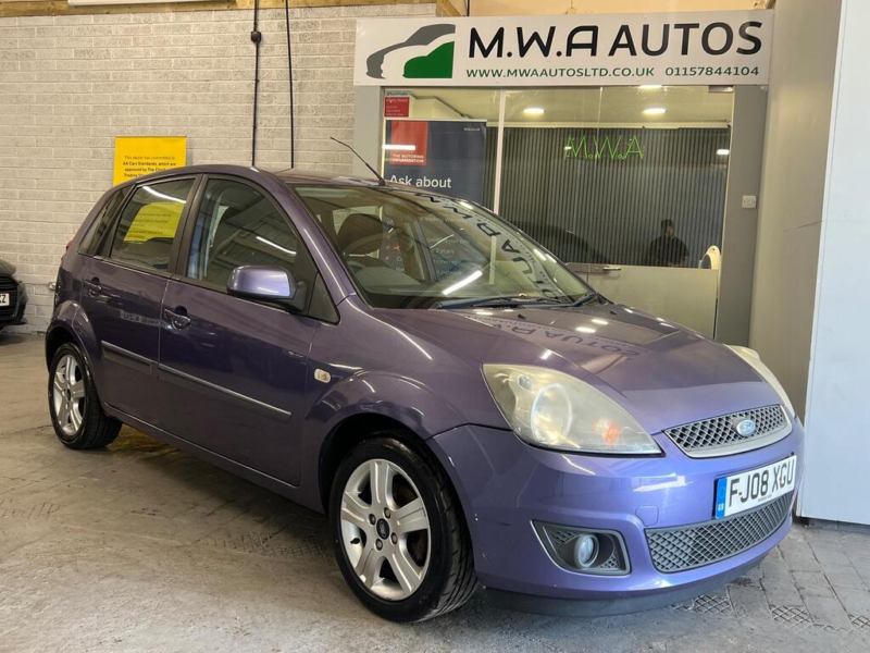 2009 Ford Fiesta 1.4 Zetec Climate Hatchback 5dr Petrol Manual (147 G/km, 79 Bhp) in Purple — image 1