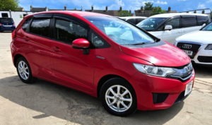 2014 Honda Fit 1.5l Hybrid- Ulez/caz Pass- Free 18months Gold Warranty & 12months Aa Breakdown Cover in Red — image 2