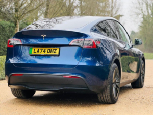 2024 Tesla Model Y Long Range Auto Rwd 5dr in Blue — image 3