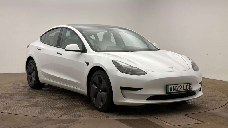 2022 Tesla Model 3 Standard Range Plus in White — image 1