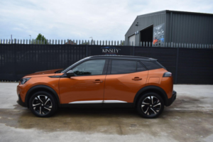 2023 Peugeot E-2008 50kwh Gt Auto 5dr (7kw Charger) in Orange — image 4