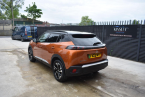 2023 Peugeot E-2008 50kwh Gt Auto 5dr (7kw Charger) in Orange — image 5