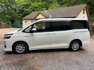 2014 Toyota Voxy 1.8 Hybrid Synergy Drive Auto 7 Seater in White — image 4
