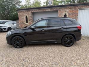 2022 BMW X1 1.5 X1 Xdrive25e Sport in Black — image 4