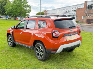 2023 Dacia Duster 1.0 Tce Prestige SUV 5dr Petrol Manual Euro 6 (s/s) (90 Ps) in Orange — image 5